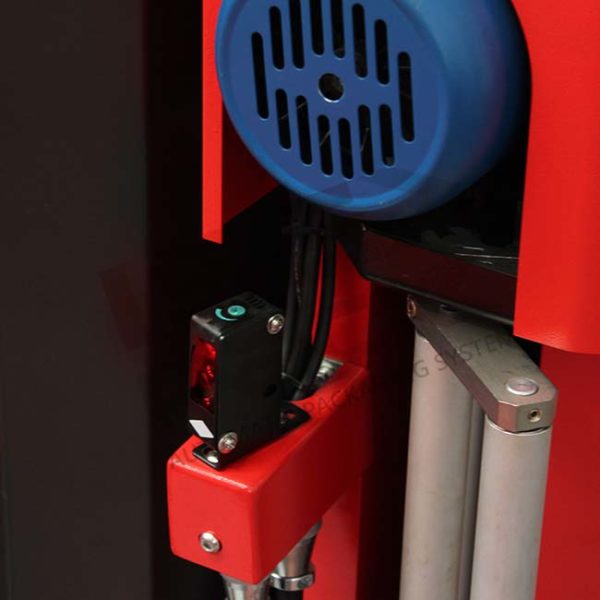 Detail of load reading photocell on automatic pallet wrapper